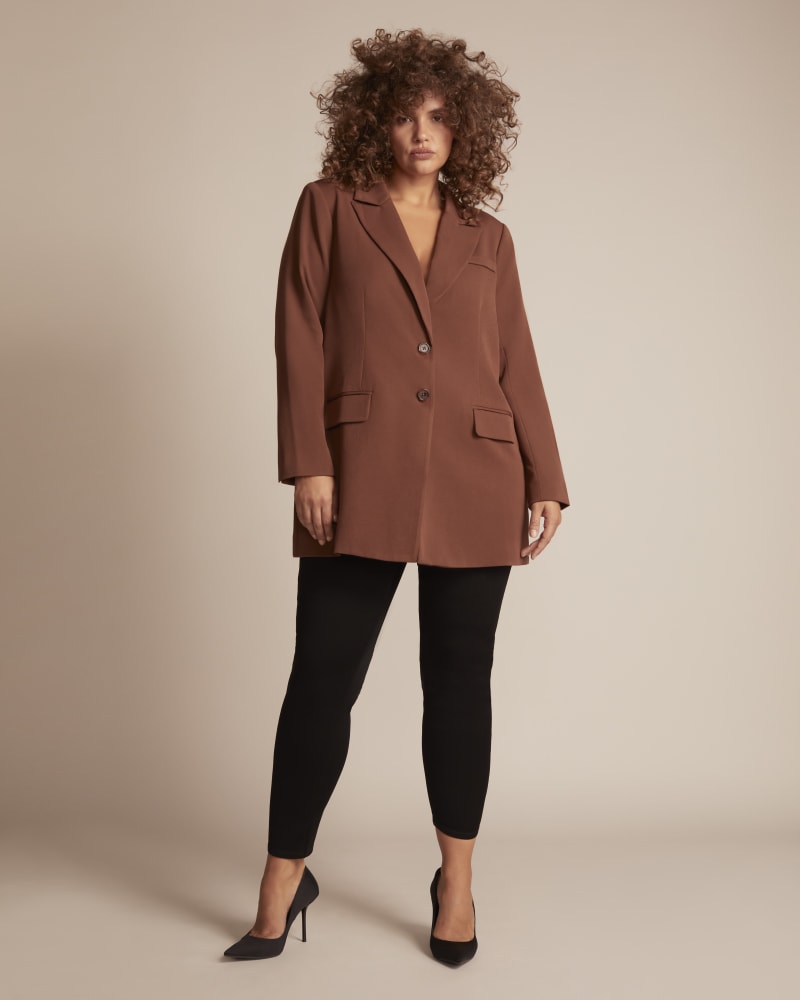 Front of a model wearing a size 14 Imani Longline Blazer in Brown by 11 Honoré Collection. | dia_product_style_image_id:245379